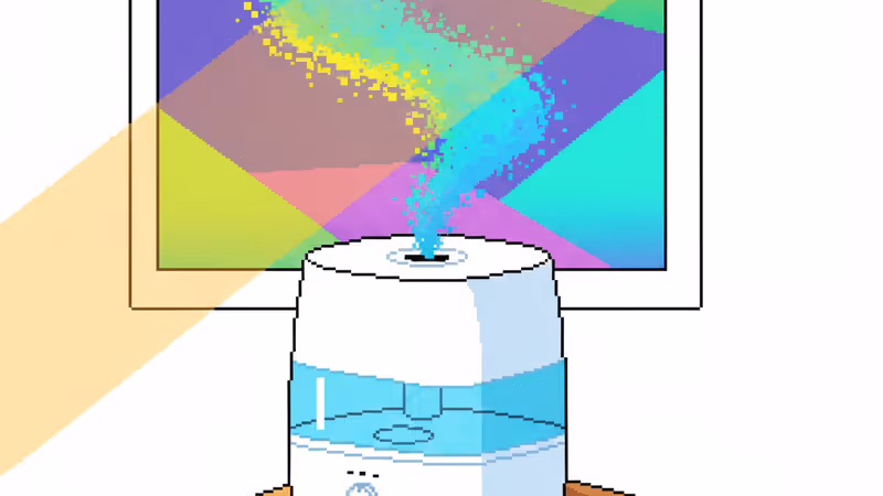 Levoit 2.5L humidifier emitting mist on a nightstand