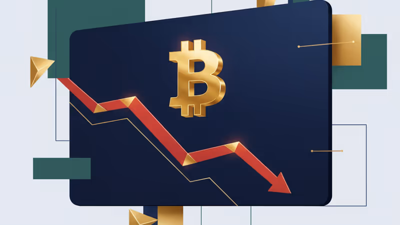 下落傾向を示す赤いグラフとビットコインのロゴ