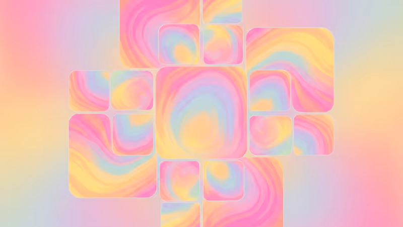 色とりどりの文字タイルと機械式時計の歯車が並んだミニマルな木製デスク